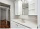 Clean bathroom with white cabinets and a large mirror at 739 Laurel Ln, Fortville, IN 46040