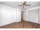 Bedroom featuring hardwood floors and a closet at 739 Laurel Ln, Fortville, IN 46040
