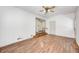 Spacious living room with hardwood floors and neutral walls at 739 Laurel Ln, Fortville, IN 46040