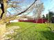 Backyard featuring a tree, shed and fence at 7606 Miracle Rd, Indianapolis, IN 46237