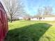 Backyard featuring a shed and open green space at 7606 Miracle Rd, Indianapolis, IN 46237