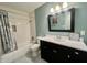 This bathroom features a vanity, shower, and toilet at 7606 Miracle Rd, Indianapolis, IN 46237