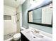 Bright bathroom with modern sink, walk-in shower, and subway tile surround at 7606 Miracle Rd, Indianapolis, IN 46237