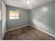 This bedroom has carpet flooring and neutral paint at 7606 Miracle Rd, Indianapolis, IN 46237