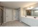 Large bathroom with double vanity, walk-in shower, and stylish mosaic tile flooring at 8160 Shaldon Ct, Zionsville, IN 46077