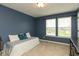 Charming bedroom offers great natural light and neutral colored carpet at 8160 Shaldon Ct, Zionsville, IN 46077