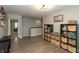 Bonus room with hardwood floors, storage shelves and view of hallway at 8160 Shaldon Ct, Zionsville, IN 46077