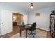 Home office featuring a desk, chair, rug, and an open doorway at 8160 Shaldon Ct, Zionsville, IN 46077