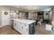 Open concept kitchen features a large island, stainless steel appliances, and an eat-in dining area at 8160 Shaldon Ct, Zionsville, IN 46077