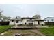 Spacious backyard with a patio and a gazebo perfect for outdoor entertaining and relaxation at 8616 Old Dominion Ct, Indianapolis, IN 46231