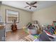 Well-lit playroom features a variety of toys, a ball pit, and a comfortable seating area, ideal for activities at 919 Oak Park Dr, Shelbyville, IN 46176