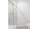 Clean bathroom includes a tiled shower with glass door, chrome hardware, and new flooring at 9222 Anthem Ave, Plainfield, IN 46168