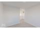 Cozy room with neutral walls and carpet, with an opening to the hallway at 9222 Anthem Ave, Plainfield, IN 46168