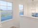 Foyer features large windows and a modern pendant light fixture at 9222 Anthem Ave, Plainfield, IN 46168