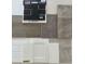 Selection of interior finishes including flooring, brick, paint, carpet, and cabinet samples at 9222 Anthem Ave, Plainfield, IN 46168
