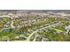 Aerial view of a residential neighborhood with nearby commercial locations at 9328 Haddington W Dr, Indianapolis, IN 46256