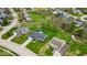 Aerial neighborhood view featuring this home with well-maintained lawn at 9328 Haddington W Dr, Indianapolis, IN 46256
