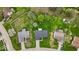 Aerial view of a property featuring a well-maintained yard and mature trees at 9328 Haddington W Dr, Indianapolis, IN 46256