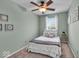Bedroom featuring neutral walls, carpet, and coordinated decor for a serene and relaxing atmosphere at 9328 Haddington W Dr, Indianapolis, IN 46256