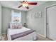 Bedroom featuring neutral walls, carpet, and coordinated decor for a serene and comfortable atmosphere at 9328 Haddington W Dr, Indianapolis, IN 46256