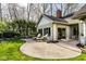 Peaceful backyard featuring an inviting patio, outdoor seating, and lush greenery and landscaping at 9435 Tamarack Dr # 94, Indianapolis, IN 46260