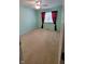 Bedroom with green walls, a window with curtains, carpet, and neutral colors at 10629 Simsbury Ct, Indianapolis, IN 46236