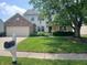 Charming home with well-manicured lawn and mature tree in a serene neighborhood at 10629 Simsbury Ct, Indianapolis, IN 46236