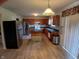 Spacious kitchen with stainless appliances, central island, and ample cabinet space at 10629 Simsbury Ct, Indianapolis, IN 46236