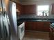 A kitchen with stainless steel appliances and tile backsplash at 10629 Simsbury Ct, Indianapolis, IN 46236