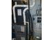 A water heater and furnace in the basement at 10629 Simsbury Ct, Indianapolis, IN 46236