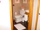 Charming powder room featuring a unique sink and stylish decor at 10916 President Cir, Indianapolis, IN 46229