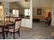 Open-concept dining and living space featuring stylish decor at 10916 President Cir, Indianapolis, IN 46229