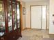 Inviting foyer with tiled flooring and view of the front door at 10916 President Cir, Indianapolis, IN 46229