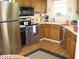 Kitchen with stainless steel appliances and ample cabinet space at 10916 President Cir, Indianapolis, IN 46229