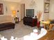 Cozy living room featuring comfortable seating and neutral decor at 10916 President Cir, Indianapolis, IN 46229