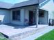 Relaxing covered patio space with outdoor seating perfect for enjoying the outdoors at 10916 President Cir, Indianapolis, IN 46229