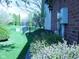 Well-maintained lawn featuring a mix of grass and bushes around the property at 10916 President Cir, Indianapolis, IN 46229