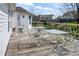 Open back deck of home with patio seating and a view of backyard at 11631 Tucker Ct, Indianapolis, IN 46229
