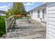 Wide angle view of the home's back deck with patio furniture and white railing at 11631 Tucker Ct, Indianapolis, IN 46229