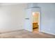 A bedroom with blue accent walls and a view into the bathroom, offering a tranquil and private retreat at 11631 Tucker Ct, Indianapolis, IN 46229
