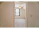 View from doorway into neutral bedroom, with window and ceiling fan at 11631 Tucker Ct, Indianapolis, IN 46229