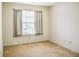 Bedroom featuring a large window, providing natural light and a bright atmosphere at 11631 Tucker Ct, Indianapolis, IN 46229