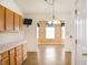Convenient kitchen adjacent to dining area at 11631 Tucker Ct, Indianapolis, IN 46229