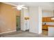 Open-concept living room leading to the kitchen showcasing the high ceiling and natural light at 11631 Tucker Ct, Indianapolis, IN 46229