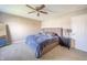 Comfortable bedroom with a ceiling fan, neutral walls, and a plush bed for a relaxing retreat at 1231 Chesterfield Dr, Anderson, IN 46012
