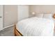 Cozy bedroom with a plush bed, a closet with bifold doors, and neutral decor for a tranquil ambiance at 1231 Chesterfield Dr, Anderson, IN 46012