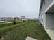 This home has a large grassy backyard and neighbors houses surrounding the lot at 1268 Newton St, Avon, IN 46123