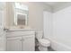 Full bathroom with shower and tub combination with white subway tile and white vanity with chrome hardware at 1268 Newton St, Avon, IN 46123