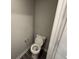 This well-lit half bathroom features a toilet and neutral colored walls, for added convenience and style at 1268 Newton St, Avon, IN 46123