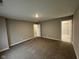 Spacious bedroom with neutral carpet, ensuite bathroom and walk in closet at 1268 Newton St, Avon, IN 46123